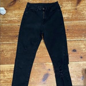 Black jeans with light rips